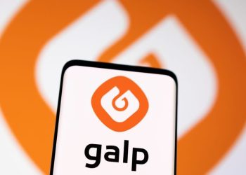 Close-up of a smartphone screen displaying the Galp logo (orange emblem) with the word 'galp' on a white background.