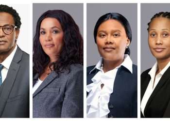 Four individual professional headshots in a row: a man in a suit with glasses; a woman with wavy dark hair; a woman in a white blouse and dark blazer; a woman with braided hair in a black blazer.