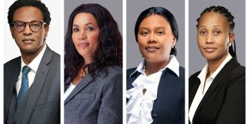 Four individual professional headshots in a row: a man in a suit with glasses; a woman with wavy dark hair; a woman in a white blouse and dark blazer; a woman with braided hair in a black blazer.