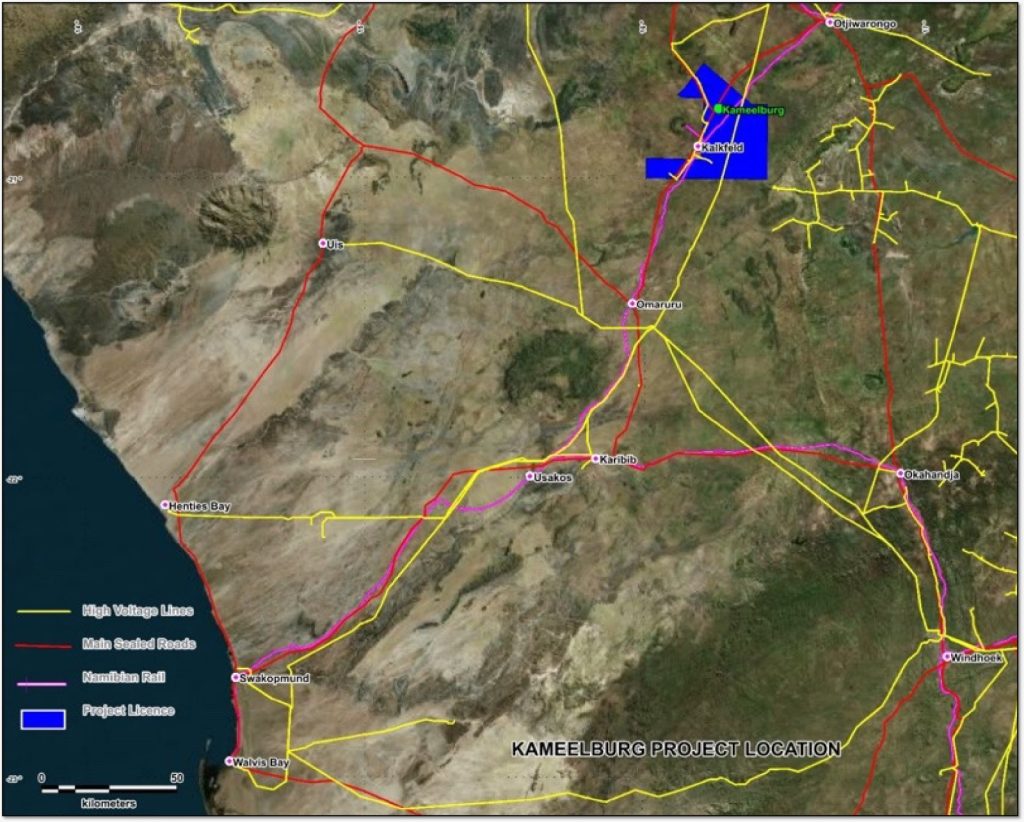 Map of the Kameelburg project area showing high-voltage lines (yellow), main sealed roads (red), Kamiblan rail (purple), and the project license area (blue box) with town labels and coast to the left.