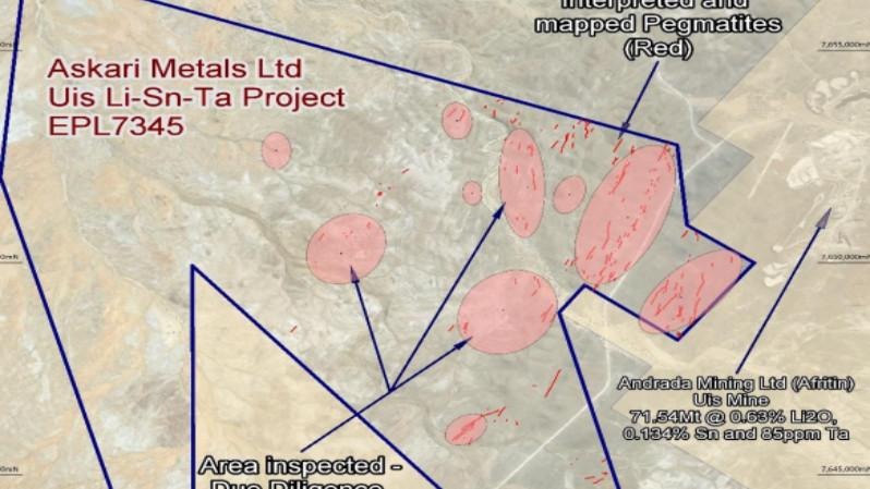 ASKARI | Mining and Energy Namibia | Namibia’s Leading Mining & Energy News Geologic exploration map for Askari Metals Uis Li-Sn-Ta project with pink mapped pegmatite bodies inside blue outlined boundaries; notes indicate area inspected and mine labels.