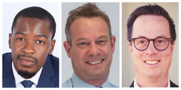 Three side-by-side headshots of men in business attire: left a Black man in a navy suit, center a smiling man in a blue shirt, right a man with glasses.