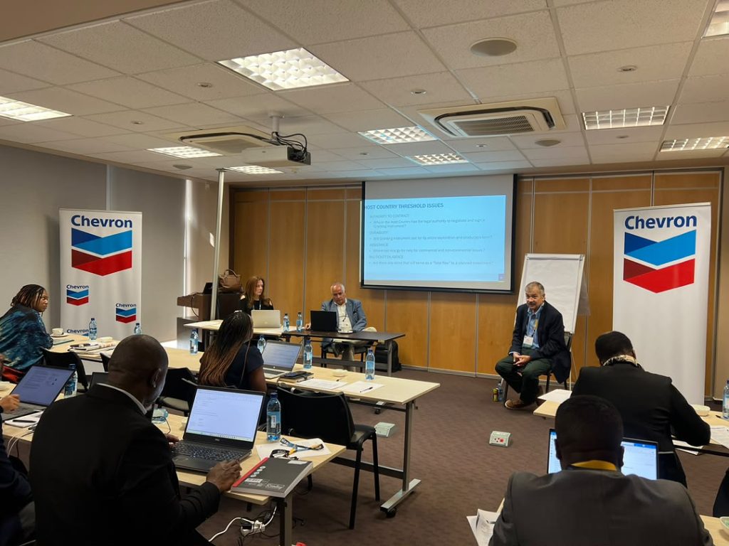 WhatsApp Image 2026-09-19 at 85610 AM | Mining and Energy Namibia | Namibia’s Leading Mining & Energy News Panel discussion in a conference room with Chevron banners, projector screen, and attendees using laptops and notes on tables.