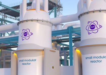 Two large white small modular reactor modules with SMR logo connected by teal framework at an industrial facility, panels labeled 'small modular reactor'